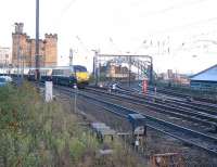 The East Coast 13.30 Edinburgh - Kings Cross runs over the much simplified Newcastle East Junction on its way into Central Station. The old Coast/Wearside bay platforms are now part of the car park. [See image 1616] for the same location 30 years earlier, prior to the changes to track and pointwork made possible by the reduction in conflicting movements. <br><br>[Malcolm Chattwood 01/12/2012]