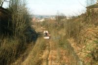 Track lifting operations underway along the former Spen Valley line at Cleckheaton in February 1997, seen looking towards Low Moor. <br><br>[David Pesterfield 14/02/1997]