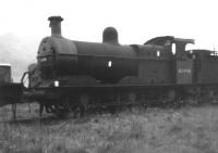 Johnson Midland 3F 0-6-0 no 43496 stored in the sidings alongside Rowsley shed, Derbyshire, on 21 October 1962, some 2 months after withdrawal. <br><br>[David Pesterfield 21/10/1962]