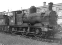 GWR Dean Goods 0-6-0 no 2516, built at Swindon in 1897, seen outside the Works in 1961 awaiting restoration to prepare for display in the then Swindon Railway Museum, housed in a former chapel building. <br><br>[David Pesterfield 07/05/1961]