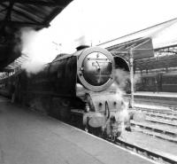 Stanier 'Coronation' Pacific no 46247 <I>City of Liverpool</I> stands alongside platform 6 at Crewe Station in April 1962 with a southbound service thought to be off the North Wales coast route. <br><br>[David Pesterfield 30/04/1962]