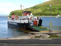 The MV <I>Loch Tarbert</I> off-loads its sole vehicle on arrival at Lochranza from Claonaig in June 2012. The return journey had a full load - with our vehicle alarm operating twice on the crossing to provide additional entertainment. [See image 41909]<br><br>[David Pesterfield 19/06/2012]