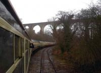 This is Moorswater viaduct, seen from Moorswater, and not to be confused with Liskeard viaduct [see image 29447]. The train is the Pathhfinder Tours <I>Hullaba-Looe</I> on 10 February 2013. One of the piers for the earlier timber viaduct can be seen above the second coach.<br><br>[Ken Strachan 10/02/2013]