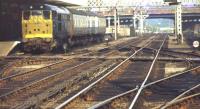 Looking through Lincoln station in October 1974 as a class 31 prepares to leave with a TPO service destined for Newcastle.<br><br>[Ian Dinmore 03/10/1974]