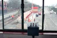 View from the signalbox of the level crossing at Balloch Central in 1988 with work on the new station almost complete. The control panel for the crossing barriers is in the centre foreground. [See image 8333]<br><br>[Ewan Crawford //1988]