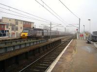 43304 is the rear power car on the 09.23 CrossCountry HST departure to Plymouth seen leaving Wakefield Westgate on a misty March morning.<br><br>[David Pesterfield 05/03/2013]