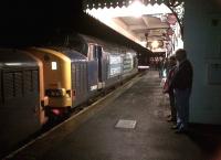 Two of the three class 37 locomotives involved with the Pathfinder Tours 'Hullaba-Looe' railtour standing at Liskeard's platform 3 on 10th February [see image 29486].<br><br>[Ken Strachan 10/02/2013]