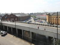 The station throat of the original York and North Midland Railway terminus, as seen from the City Walls looking south. The current York station is on the right while on the left are the old Queen St locomotive works, later the first York Railway Museum. The land in the foreground is now a car park for Network Rail's George Stephenson House offices.  <br><br>[Mark Bartlett 20/04/2013]