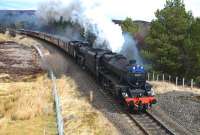 The <I>Great Britain VI</I> southbound from Inverness on 27 April, double headed by Black 5's 44871+54507, approaching the closed station at Tomatin.<br><br>[John Gray 27/04/2013]