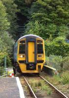 Emerging from Aberdovey tunnel number 3 into Penhelig station on 17 August 2011.<br><br>[Ian Dinmore 17/08/2011]