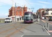 <I>Tracks to Nowhere - Yet</I>. In Talbot Square by the North Pier tram stop a new junction was installed in the refurbished tramway for a planned (but until now unfunded) branch to Blackpool North railway station. <I>Flexity</I> 009 passes over the pointwork of the projected North to East chord of a triangular junction. <br><br>[Mark Bartlett 14/05/2013]