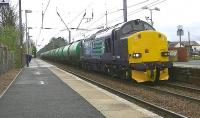 DRS 37606 runs through Barassie on 10 May with the 6R46 Grangemouth - Prestwick Airport tanks. (The locomotive was deputising for failed Colas Rail 66847.)<br><br>[Ken Browne 10/05/2013]