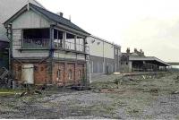 Remains of the 4-platform Coulsdon North station in Surrey, looking north in 1984. The station had been closed in September 1983 and the site was completely cleared by early 1986. Part of the area is now occupied by industrial and commercial premises, with the A23 Coulsdon relief road running through the site.<br><br>[Ian Dinmore 27/02/1984]