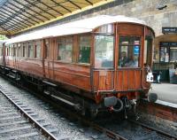 The unique ex-GNR teak Invalid Saloon no 3087, built at Doncaster in 1909. The coach was modified in more recent times to incorporate an 'observation end'. The vehicle is seen here on the rear of a NYMR train leaving Pickering for Grosmont in June 2013.<br><br>[John Furnevel 01/06/2013]