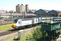 On an unusually hot 4 June 2013, the 12.00 Kings Cross - Inverness <I>Highland Chieftain</I> pulls away from the York stop.<br><br>[John Furnevel 04/06/2013]