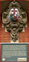 Merged images showing the crest of the North Eastern Railway on its former York Headquarters. The board below explains the origin of the three shields that form the crest.<br><br>[John McIntyre 13/07/2013]
