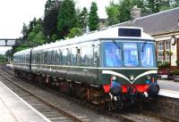 <I>The Cat's Whiskers!</I> The Strathspey Railway DMU played its part in the 150th anniversary celebrations and is seen here nicely turned out at Boat of Garten on 3 August 2013. [See image 44056]<br><br>[John Gray 03/08/2013]