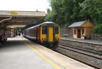 156497 at Matlock on 7 August with an East Midlands service from Beeston.<br><br>[Bruce McCartney 07/08/2013]