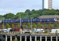 A westbound train on the north bank of the Clyde near Yorkhill on 16 August 2013.<br><br>[Colin Miller 16/08/2013]