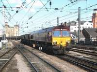 A coal train about to pass Newcastle Central westbound in July 2004 behind EWS 66229.  <br><br>[John Furnevel 06/07/2004]