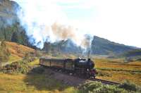 In brilliant sunshine on 30 September, K1 No.62005 picks up speed on the steady climb up to the summit west of Glenfinnan with <I>The Jacobite</I> bound for Mallaig.<br><br>[John Gray 30/09/2013]