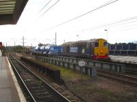 An RHTT service runs north into Wakefield Westgate on 9 October 2013 before reversing to continue along its leaf busting circuit. Leading locomotive is DRS 20305 with 20302 on the rear. <br><br>[David Pesterfield 09/10/2013]