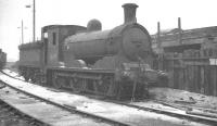NB J36 0-6-0 no 65293 photographed in the sidings alongside Eastfield shed on 4 March 1963. The locomotive had been officially withdrawn from Carlisle Canal shed approximately 4 months earlier and was eventually cut up at Motherwell Machinery & Scrap, Wishaw, in April 1965. [Additional: Peter Hughes noticed the locomotive at Gourock in April 1963 in use as a stationary boiler for carriage heating].<br><br>[K A Gray 04/03/1963]
