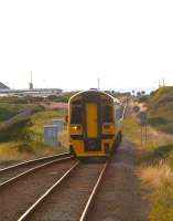 A southbound Cambrian Coast Line service approaching Tywyn station on a summer evening in August 2011, ultimate destination Birmingham International.<br><br>[Ian Dinmore 17/08/2011]