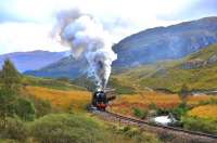 With two weeks to go until the end of the steam excursion season, autumn colours abound as Black 5 no 45407 <I>The Lancashire Fusilier</I> charges onward after a slow climb out of Glenfinnan Station with <I>The Jacobite</I> for Mallaig. <br><br>[John Gray 21/10/2013]