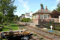 The station and signal box at Warcop, Cumbria, on the Eden Valley line, photographed looking north west on a fine afternoon in May 2006. The station closed to passengers in 1962 and the line back to Appleby in 1989. Warcop is now the headquarters of the Eden Valley Railway. [See image 32774]<br><br>[John Furnevel 11/05/2006]