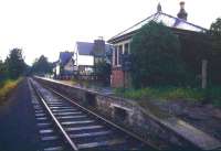 Looking north along the platform at a wet Warcop station in August 1988. [See image 32774]<br><br>[Ian Dinmore 23/08/1988]