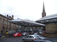 West end down side former bay platforms and canopy within what is now a parking area at Newcastle Central station, seen here on 28 November 2013.<br><br>[David Pesterfield 28/11/2013]