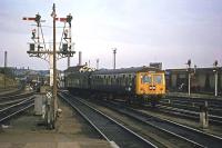 A pre-electrification scene at Norwich on 27th September 1977. A Cravens DMU is departing for Lowestoft.<br><br>[Mark Dufton 27/09/1977]