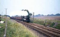 The up <I>Granite City</I> photographed near Cumbernauld in the late summer of 1965. On this occasion Perth Black 5 no 45473 is standing in for a failed diesel locomotive.<br><br>[G W Robin 31/08/1965]