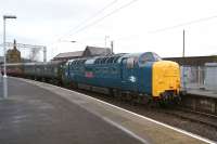 Not an everyday sight at Carnforth. Deltic 55002 <I>The Kings Own Yorkshire Light Infantry</I> arrives on 1 February 2014, returning two coaches that had been borrowed for the move of <I>Duchess of Hamilton</I> from Shildon to York earlier in the week.<br><br>[John McIntyre 01/02/2014]