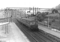 An eastbound train for Bridgeton arrives at Dalmuir in 1960 (named Dalmuir Park at that time). Photographed shortly after the commencement of electric services on the line.<br><br>[David Stewart //1960]