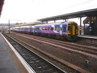 Northern Rail 158850 and a sister unit call at Wakefield Westgate on 20 March with the 07.15 Sheffield - Leeds all stations service via Moorthorpe. <br><br>[David Pesterfield 20/03/2014]