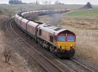 66093 nears Bank Junction, New Cumnock, on 31 March with coal from Hunterston for West Burton power station.<br><br>[Bill Roberton 31/03/2014]