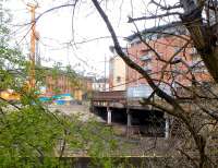 View across the Kelvin towards Benalder Street Bridge and what little remains of Partick Central on 6 April 2014. A pile driver is now on site in connection with the construction of new flats to be built here. [See image 45979]<br><br>[Colin Miller 06/04/2014]