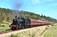 Strathspey Ivatt 2-6-0 No.46512 photographed south of Broomhill on a sunny 19 April with the 13.30 for Aviemore.<br><br>[John Gray 19/04/2014]