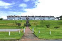 Designed by James Miller, built by the Glasgow and South Western Railway Company and opened in 1906 as the Station Hotel, Turnberry. View from the west in May 2014 [see image 7207]. <br><br>[Colin Miller 11/05/2014]