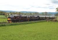 37685 <i> Loch Arkaig </i> and 37516 <i> Loch Laidon </i> bring  <i> The Royal Scotsman </i>  round the curve at the west side of  Beauly on 8 May on the way to Kyle of Lochalsh.<br><br>[John Gray 08/05/2014]