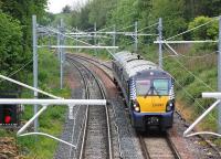 334035 approaches Cumbernauld from the Glasgow direction on 30 May 2014.<br><br>[Bill Roberton 30/05/2014]