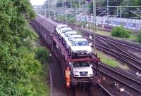 Freight in Lubeck goods yard on 1 June 2014, including a consignment of new Audis.<br><br>[John Steven 01/06/2014]