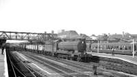 O4 2-8-0 no 63818 brings mineral wagons south through Doncaster on 20 July 1963.<br><br>[K A Gray 20/07/1963]