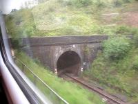 The east portal of the up line single bore Patchway tunnel as seen from a westbound First Great Western HST in early June 2014, showing the difference in track level compared with the down line.<br><br>[David Pesterfield 04/06/2014]