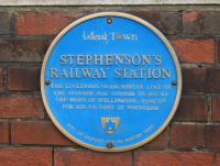 Blue plaque from the City of Salford at Eccles station. The plaque celebrates the opening of the station on the original Liverpool and Manchester Railway by the Duke of Wellington in 1830.<br><br>[John McIntyre 19/04/2014]