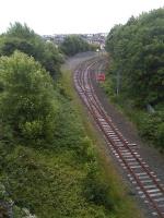 View east from River Drive bridge, South Shields, showing the run round loop from the current terminus, located just beyond the curve, with a head-shunt running below the camera  to a stop block. Alongside the loop on the right is an electrified siding used by Metro services.<br><br>[David Pesterfield 06/07/2014]