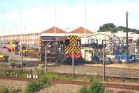 Two Class 08 locos in the north end yard at the Wabtec facility alongside Doncaster station on the morning of 14 July. 08669 is nearest the camera. <br><br>[David Pesterfield 14/07/2014]