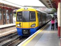London Overground 378229 calls at  Harrow and Wealdstone (shared with the Bakerloo line) on 28 July with a service for Watford Junction.<br><br>[Bill Roberton 28/07/2014]